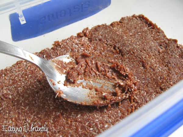 Nut-Free Raw Vegan Chocolate Fudge pressing into container