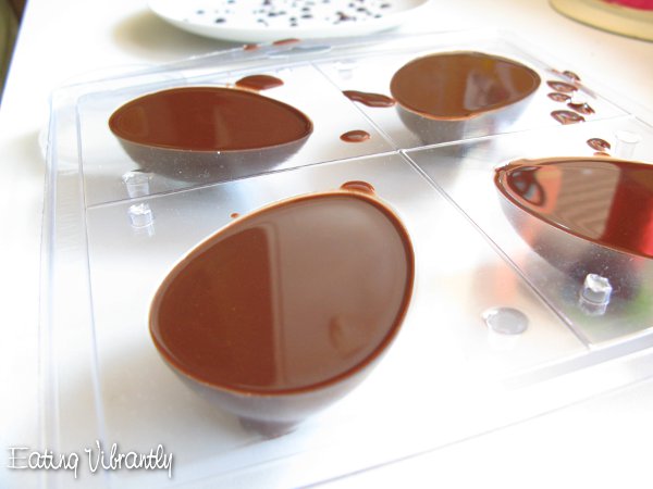 Raw Vegan Chocolate Easter Eggs in big hollow moulds